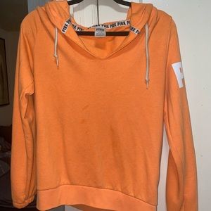 PINK bright orange pullover hoodie. Size medium.